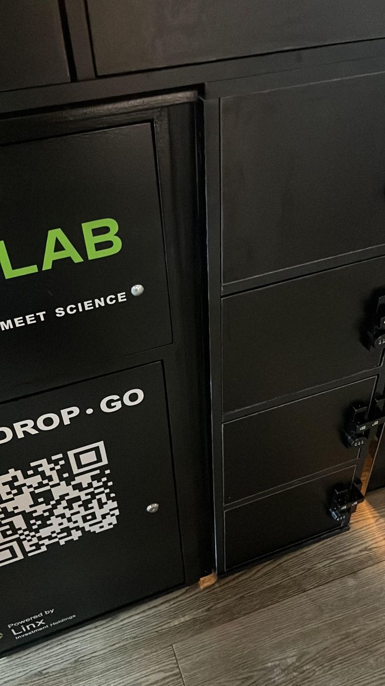 The branded panel on the locker bank
