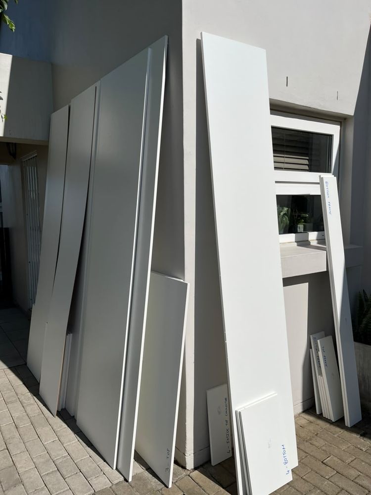 A pantry, an inverter bay and tall cupboards: Doors on site