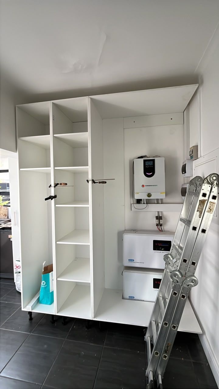 A pantry, an inverter bay and tall cupboards: Going in